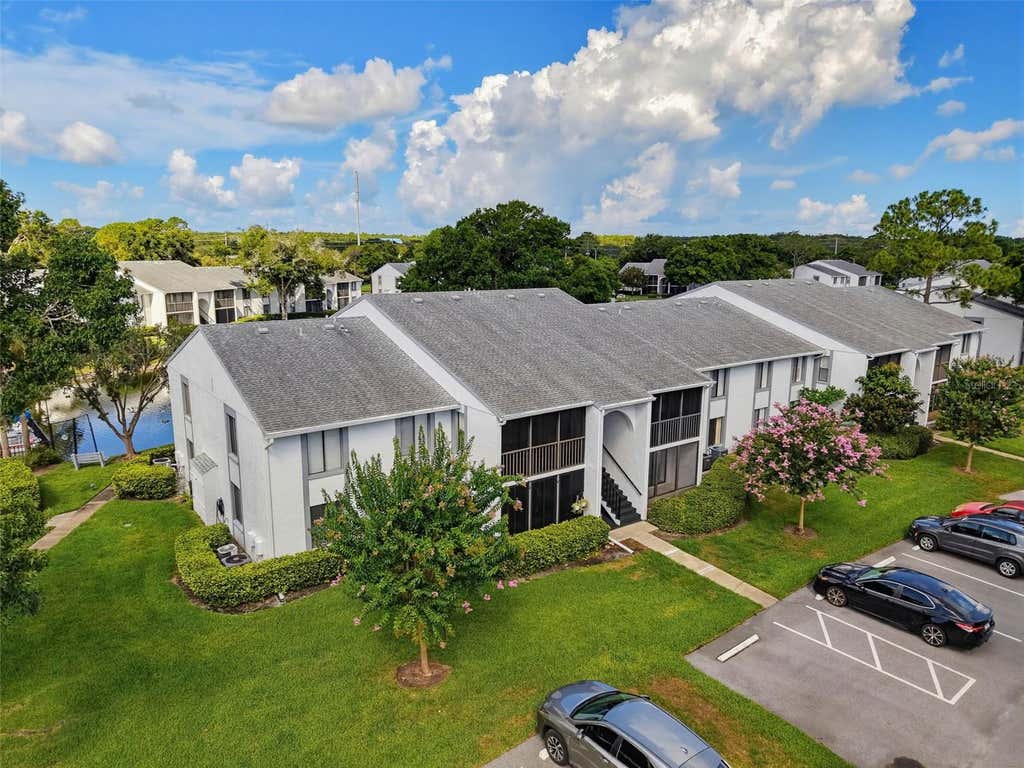 Photo of 1261 Pine Ridge Circle W #D1, Tarpon Springs, FL 34688 (MLS # TB8526660)