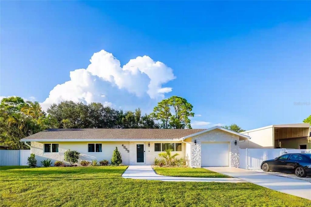 Photo of 4899 Canal Dr Lake, Lake Worth, FL 33463 (MLS # O6435006)