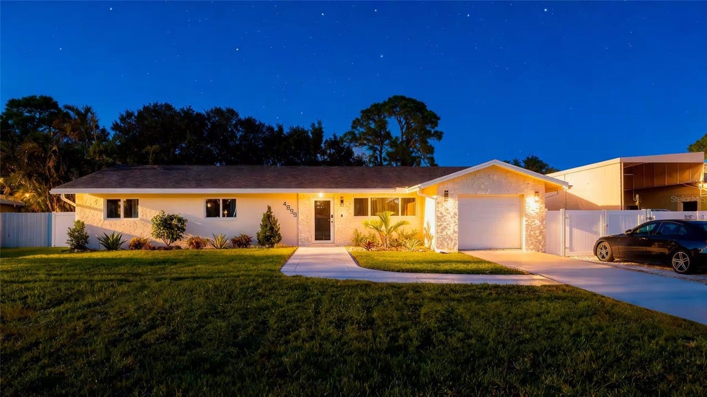 Photo of 4899 Canal Dr Lake, Lake Worth, FL 33463 (MLS # O6435006)