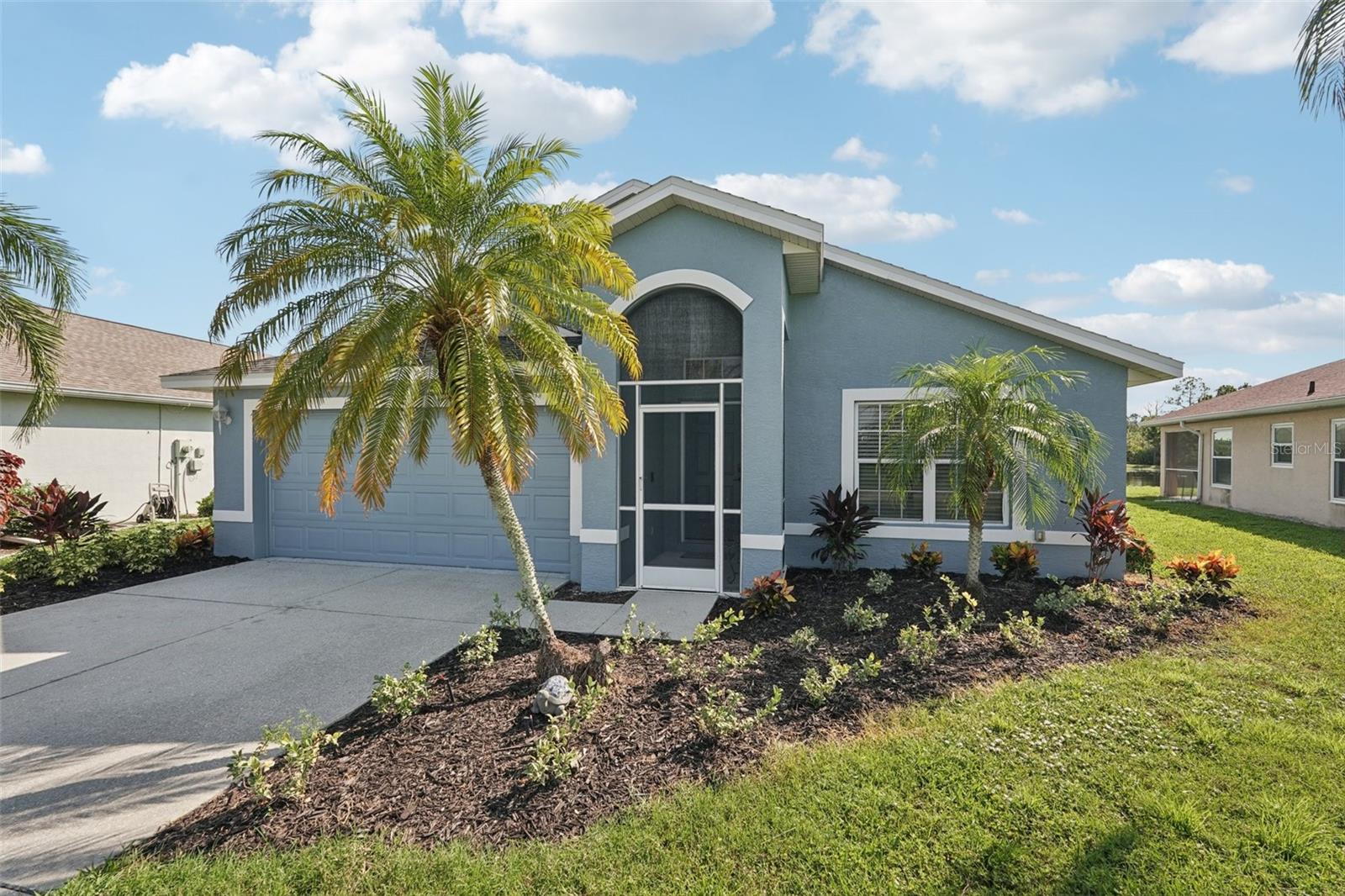 From the moment you enter you will be delighted with the best lake view in Lakeside Plantation. The preserve beyond the lake is great for bird watching and there are lake views from most rooms. The soaring ceilings and archways create an elegant ambience. The home features 4 bedrooms and 2 full bathrooms. There is also a bonus room you can use for an office, playroom, craft room etc. The eat-in kitchen features new stainless-steel Whirlpool appliances, new GFCI outlets, real oak cabinets with crown molding, granite counters, and under cabinet lighting that highlights the fabulous newly installed backsplash. Organization is a snap with the built-in cabinets in the hallway just off the kitchen. Both bathrooms have granite counters, updated lighting, shower wall extended to ceiling, and vessel sinks. The primary bath has a new toilet and professionally cleaned shower and new grout. There is NO carpet in this home. The main living areas have hardwood floors, bedrooms and bonus room are wood laminate, and the wet areas are a neutral tile. There are 3" Hunter Douglas blinds throughout the home. There is a family dining room combo when you first walk in and to the rear of the home is a separate family room with a new large remote-control lighted fan. The kitchen bar area has new pendant lights, and the eat-in kitchen has a matching pendant light. New dimmer light switches have been installed throughout. The exterior of the home was just painted as well as the garage floor, driveway and lanai pressure washed; new landscaping and irrigation was installed. The roof was replaced in 2020 and HVAC in 2022 with a UV light. The Sliding glass doors are hurricane impact as well as some of the windows. The front door has a new coded lock, and the garage door has a new remote pad and new remote controls. There is a newly installed Ring Doorbell for added security. This is a pet and smoke free home. There is a heated resort style community pool and hot tub, tennis courts, basketball and pickle ball courts, fitness center, playground, billiard room and library. Many activities at the clubhouse to enjoy! You can relax knowing your lawn care is maintained by the HOA. Don't miss the opportunity to own this lakefront beauty in the Lakeside Plantation community. Enjoy the convenience of nearby golf courses, beaches, shopping and entertainment. Schedule a private showing today!