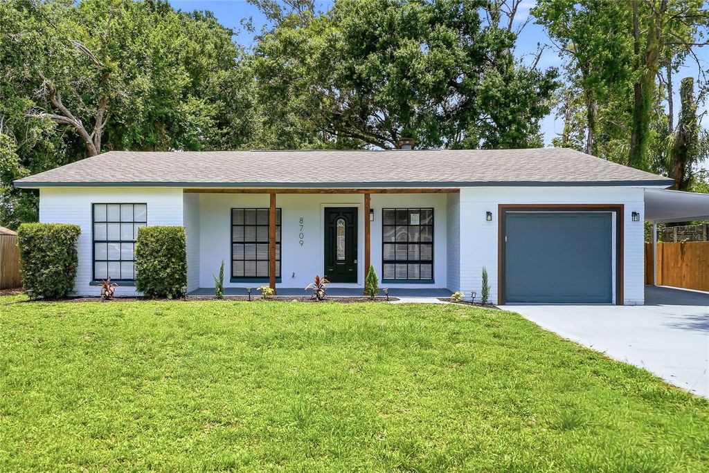 Photo of 8709 Fountain Avenue, Tampa, FL 33615 (MLS # TB8513851)