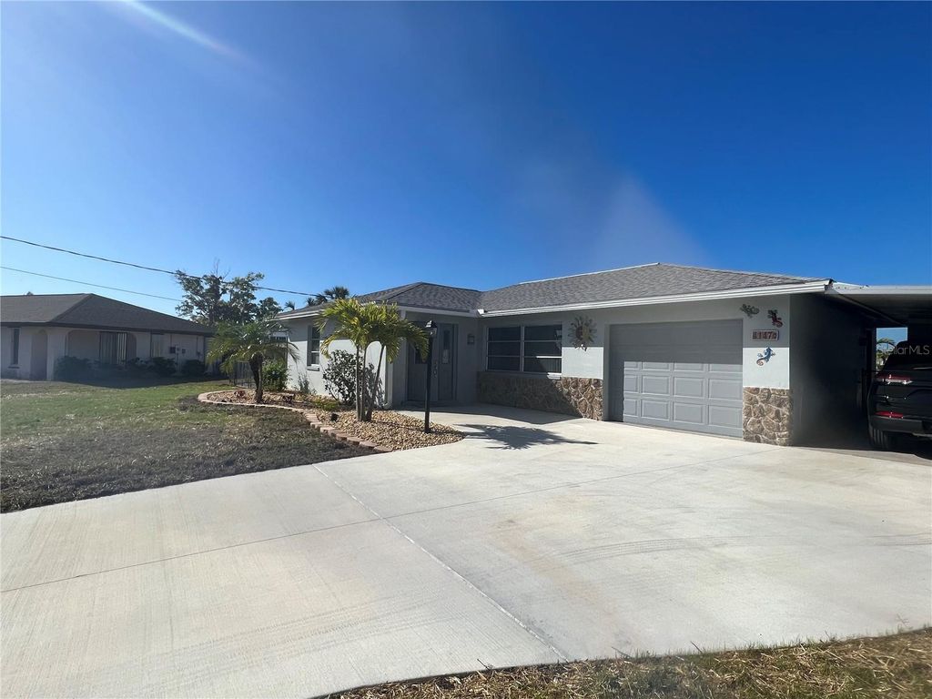 Photo of 4147 Rock Creek Drive, Port Charlotte, FL 33948 (MLS # C7473278)
