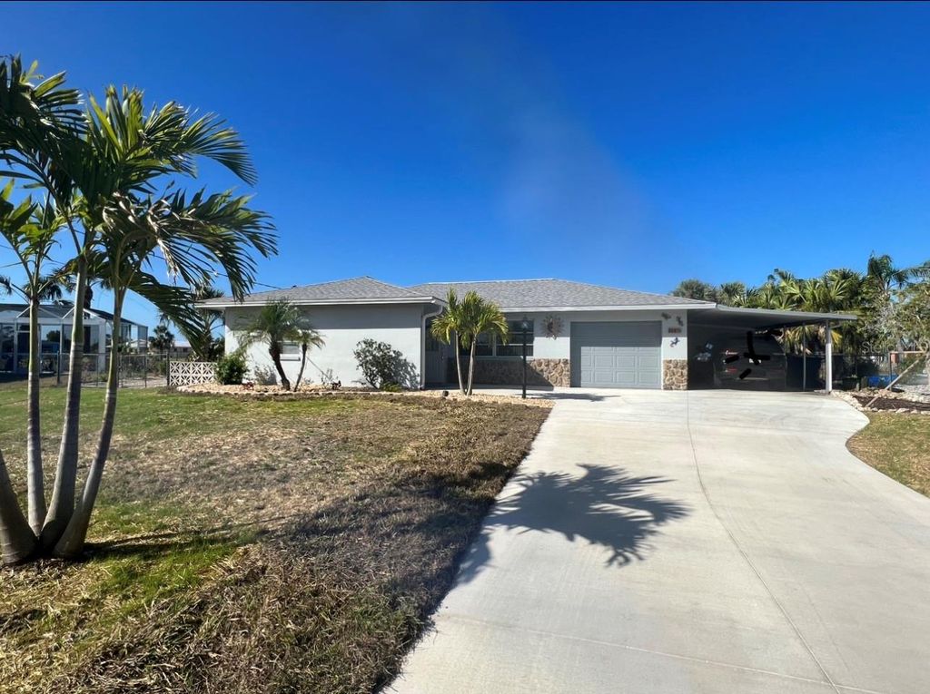 Photo of 4147 Rock Creek Drive, Port Charlotte, FL 33948 (MLS # C7473278)