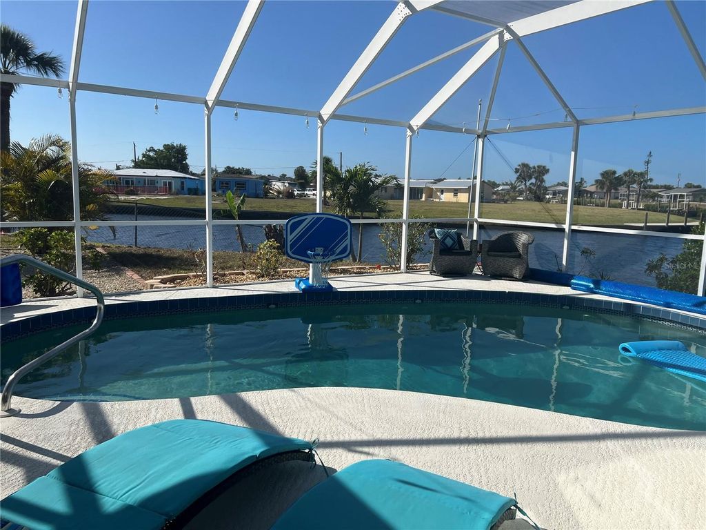 Photo of 4147 Rock Creek Drive, Port Charlotte, FL 33948 (MLS # C7473278)