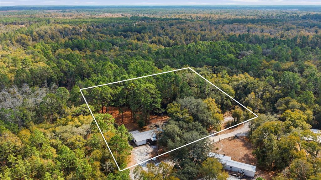 Photo of 115 Chapel Lane, Hawthorne, FL 32640 (MLS # OM718793)