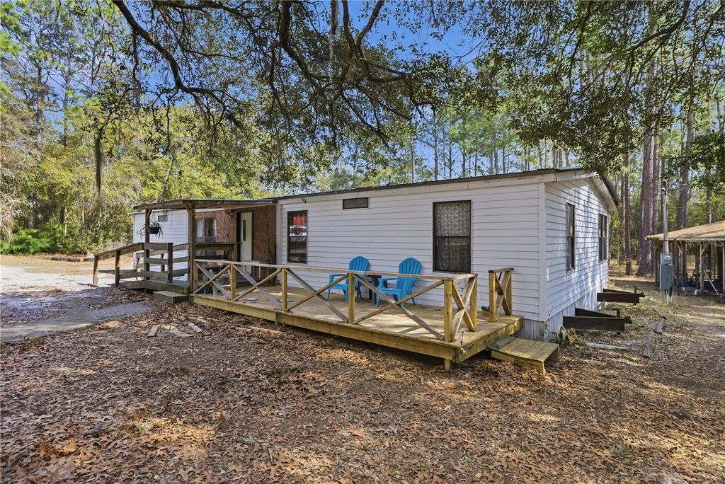 Photo of 115 Chapel Lane, Hawthorne, FL 32640 (MLS # OM718793)