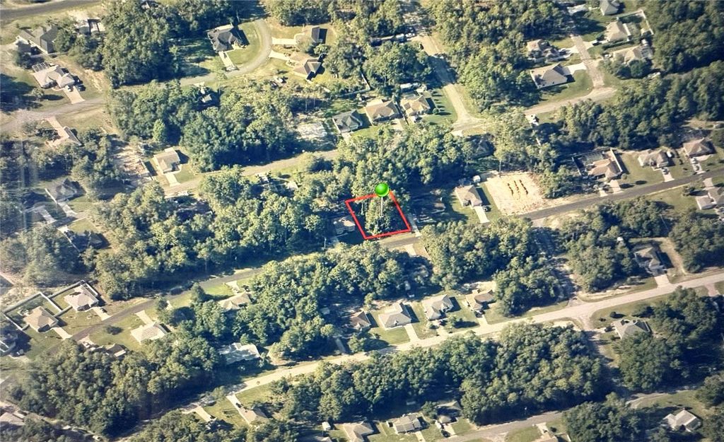 Photo of 7981 N Sarazen Drive, Citrus Springs, FL 34434 (MLS # OM716177)