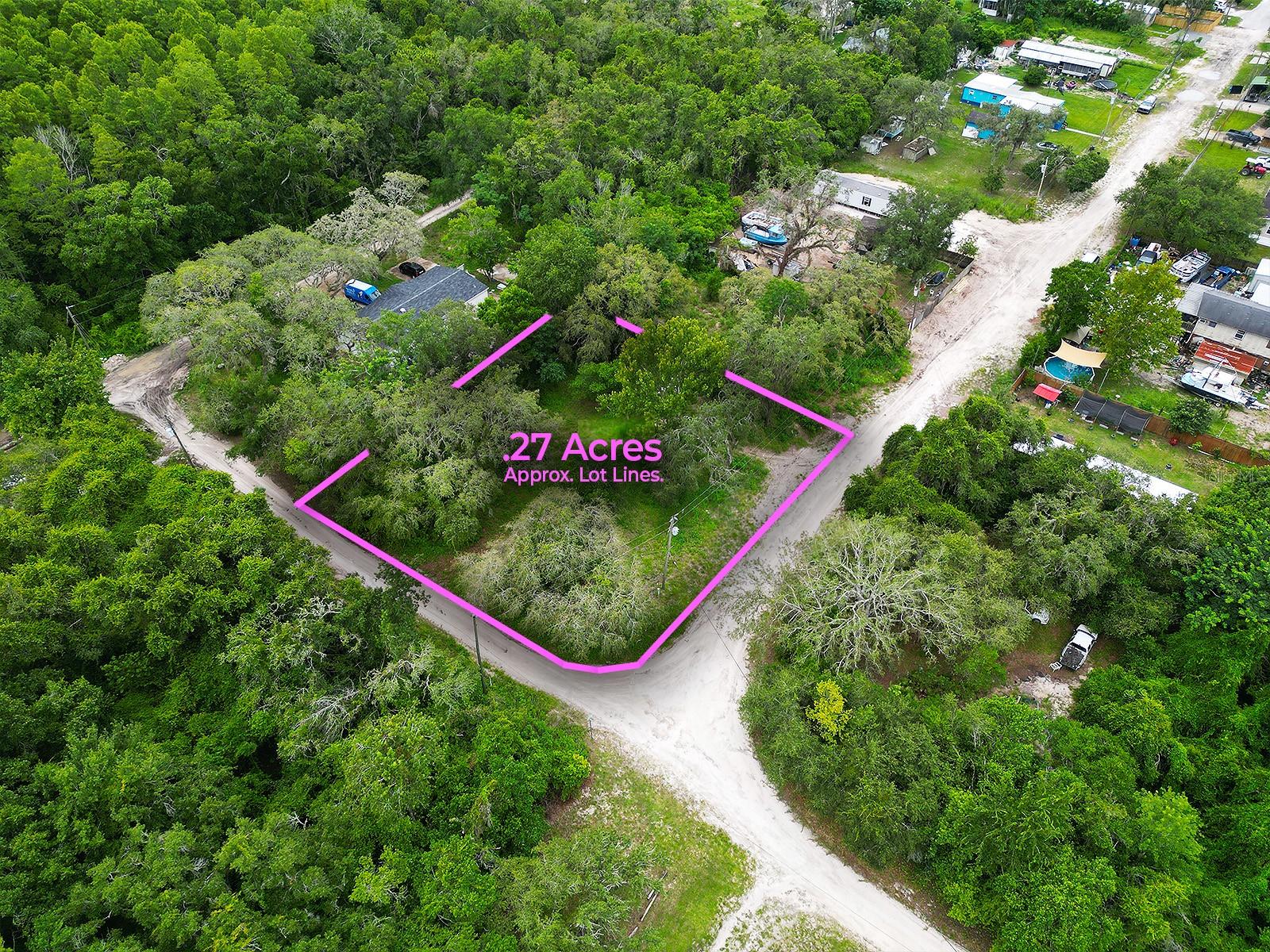 This spacious .265-acre corner lot at 9412 Labelle St offers an excellent opportunity to build your dream home. Enjoy easy access to Moon Lake Rd, connecting you to local amenities and beyond.