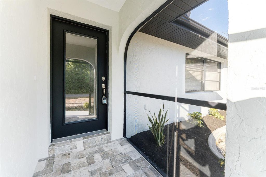 Photo of 22422 Blanchard Avenue, Port Charlotte, FL 33952 (MLS # C7520835)