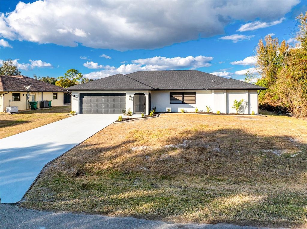 Photo of 22422 Blanchard Avenue, Port Charlotte, FL 33952 (MLS # C7520835)