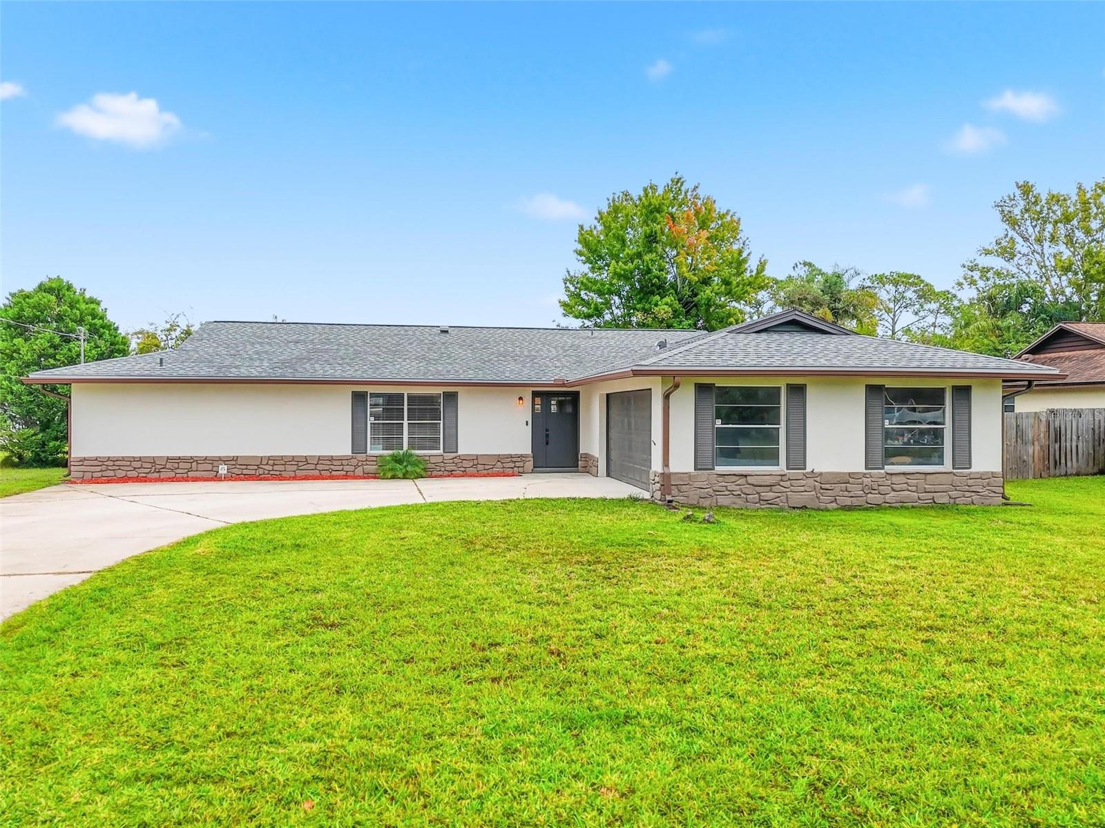 Pool home at an unbelievable price! This beautiful 3-bedroom, 2-bath single-family home offers 1,768 sq. ft. of living space and an oversized 2-car garage. Enjoy peace of mind with a new water heater (2025), A/C (2021), and roof (2018). The home features freshly painted interior and exterior, tiled bathrooms, security system, new gutters, and a fenced-in yard perfect for privacy and pets. Pool deck freshly painted and pool needs a little TLC. Conveniently located near shopping, restaurants, and more in our growing Palm Coast community. Don’t miss out—this one is a must-see!