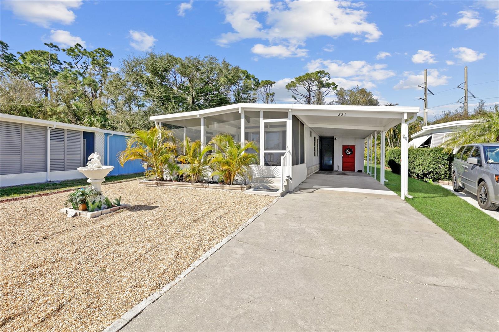 ATTRACTIVE 2-BED, 2-BATH HOME IN 55+ FOREST PARK WHERE YOU OWN THE LAND AND PAY A LOW HOA FEE OF $116.80/MONTH. Home has been meticulously maintained and offers a number of great features, including an office (possible third bedroom!), new electrical panel, roof (with transferable warranty), carport, newer HVAC system, new power utility box, large detached storage shed, and a golf cart! Situated to the rear of the park in a pretty setting that backs up to a wooded area, there is a screened sun room in the front and the back of home. Forest Park is a nice place to live with free wifi, friendly neighbors, activities, dances, holiday parties, swimming pool, and other desirable amenities. The park is located close to shopping, restaurants, and downtown Fort Myers. Come and see this great home today!