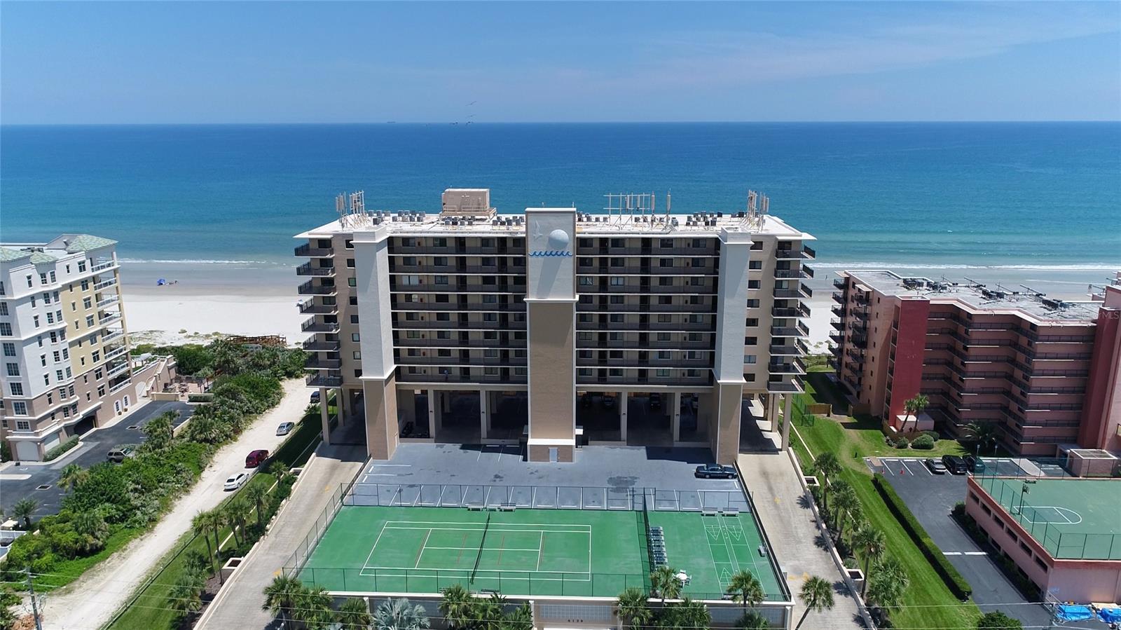 The best view in Moontide- walk right out onto the no-drive beach on the Atlantic ocean, no elevators needed, ground floor, direct oceanfront. This remodeled 2 bedroom 2 Bath condo is ready for move in and comes fully well furnished. From the moment you walk in, the Direct Ocean Views will take your breath away. Sit on your large patio as you watch the breezy views of the Ocean, Sunrises, Dolphins or walk out the front door to access the Atlantic Ocean. This Remodeled condo features, a Newer Refrigerator in (2020) , fresh A/C in 2018, stainless steel appliances, newer water heater (2020), walk in shower in the oceanfront main bedroom, and a tub in the second bathroom. This fantastic unit can be used as your own getaway or a vacation rental. If you are looking for a move-in ready condo, and a great DIRECT OCEANfront view, look no further. Moontide Condos, is one of the premier beachfront destinations in NSB, featuring gated garage parking, tennis court, shuffle board courts, sports court and grilling areas, social room, fitness room, pool and onsite management office. New Smyrna Beach has so much to offer, great restaurants, parks, beaches, outdoor activities, events, and nightlife. Very close to Orlando, Daytona Speedway, and the Space Coast. The wide white sand beach is uncrowded and attracts lots of shore birds and nesting sea turtles, perfect for long walks or smooth bike rides, shelling, fishing, or just relaxing under a beach umbrella. New Smyrna Beach is one of the Top Ten beaches in Florida, situated on a barrier Island between the Intracoastal Waterway/Indian River Lagoon. Now is your time to own your own piece of Heaven in NSB !!! Come enjoy one of the top 100 art towns in America. All information is intended to be accurate but is not guaranteed. Measurements should be verified by the prospective buyer. ;Water: City
