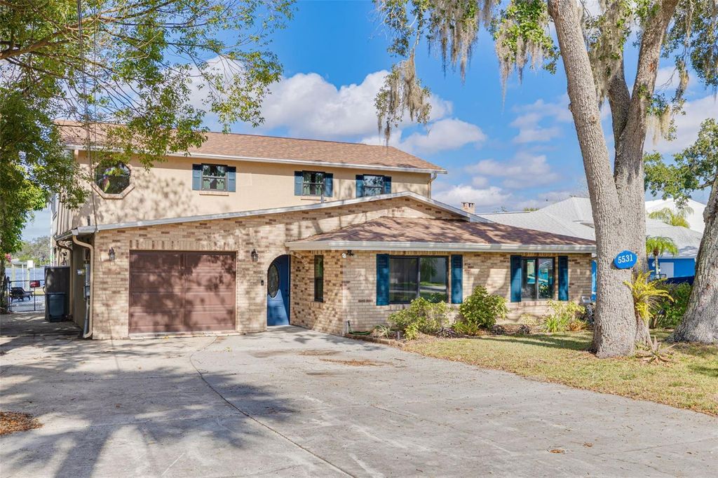 Photo of 5531 Manatee Point Drive, New Port Richey, FL 34652 (MLS # TB8460831)