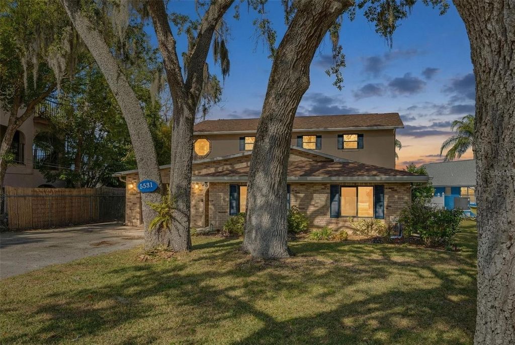 Photo of 5531 Manatee Point Drive, New Port Richey, FL 34652 (MLS # TB8460831)