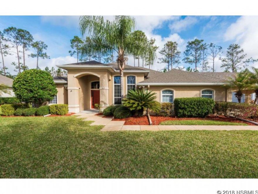 From the moment you drive up to this stunning pool home situated on a lush over sized lot, on a cul-de-sac with 6 car garage space, 2 car side entry and 4 car garage with air conditioning PLUS a 2 car portico, you will be in awe! This gorgeous home has been lovingly maintained and upgraded with the finest appointments. Owners added the 4 car garage, the 2 car portico, sunning area in backyard with pavers, fabulous built in pool bar with gas grill and refrigerator to keep your pool beverages ice cold, new pool pump, hot water heater 2 years new, granite counter tops in the kitchen, complete appliance package and the list goes on. The light and bright open floor plan is wonderful and the spacious kitchen will please even the pickiest chef's.Desired split bedroom plan, large closet space, generous master suite, inside laundry, delightful outdoor living space, spectacular screened lanai with sparkling in ground, salt water pool, perfect for entertaining, all backing up to green space. Close to top rated elementary school. This truly is a dream home with plenty of room for all your cars, toys, boat....it's the perfect package all wrapped up!Freezer in laundry room, glass case in 2 car garage, air compressor and metal cabinets in 4 car garage & master bedroom curtains do not convey.