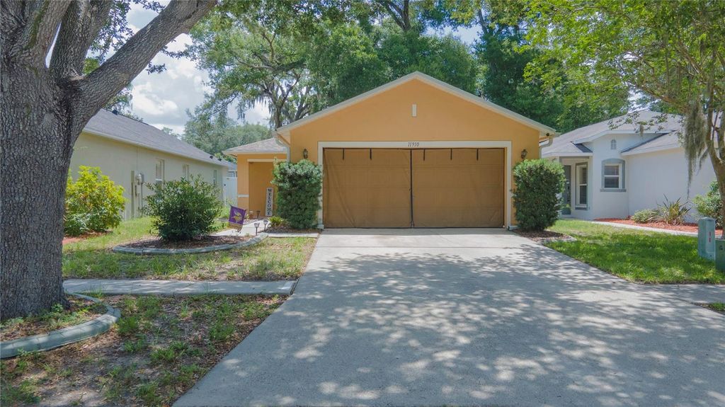 Photo of 11910 Mango Groves Boulevard, Seffner, FL 33584 (MLS # TB8512970)