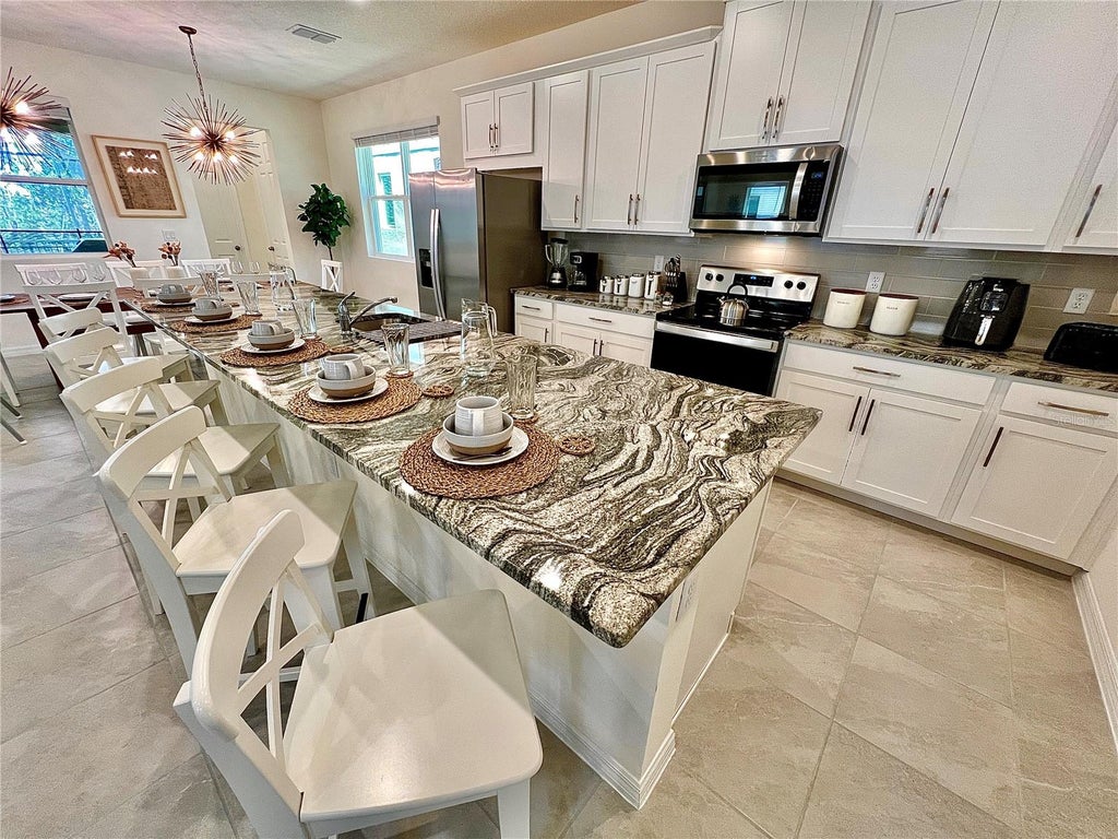 Photo of Kissimmee, FL 34747 (MLS # O6451235)