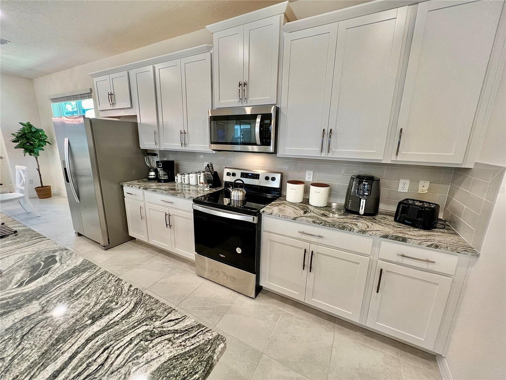 Photo of Kissimmee, FL 34747 (MLS # O6451235)