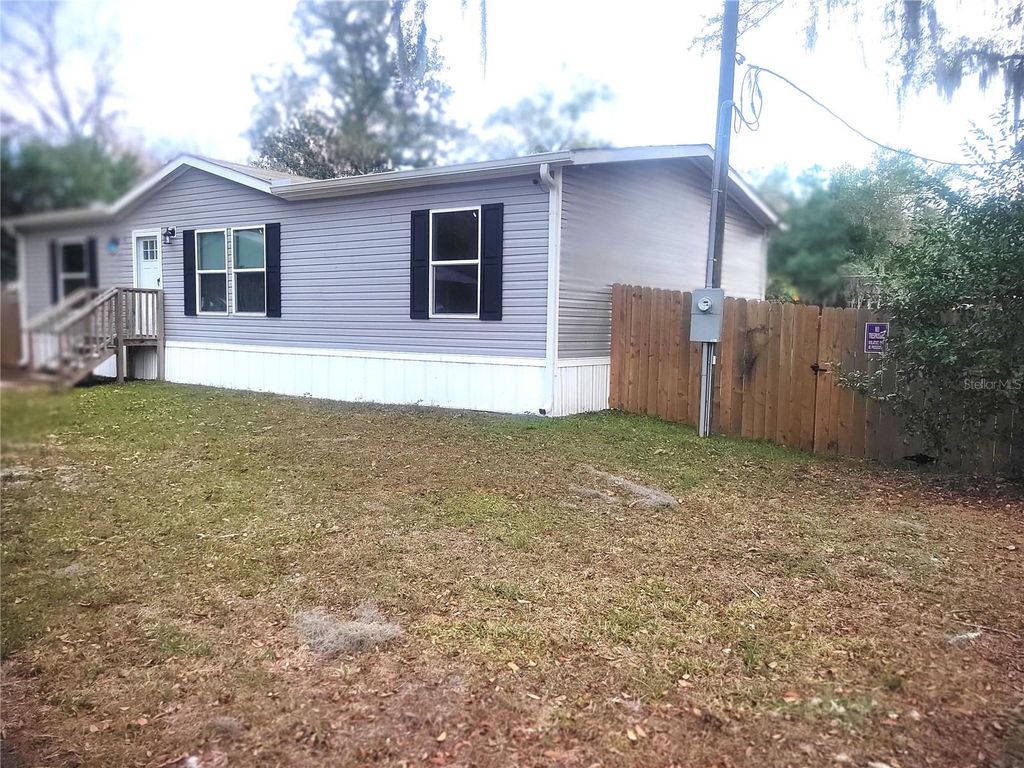 Photo of 2829 N Lakefront Drive, Hernando, FL 34442 (MLS # OM716611)