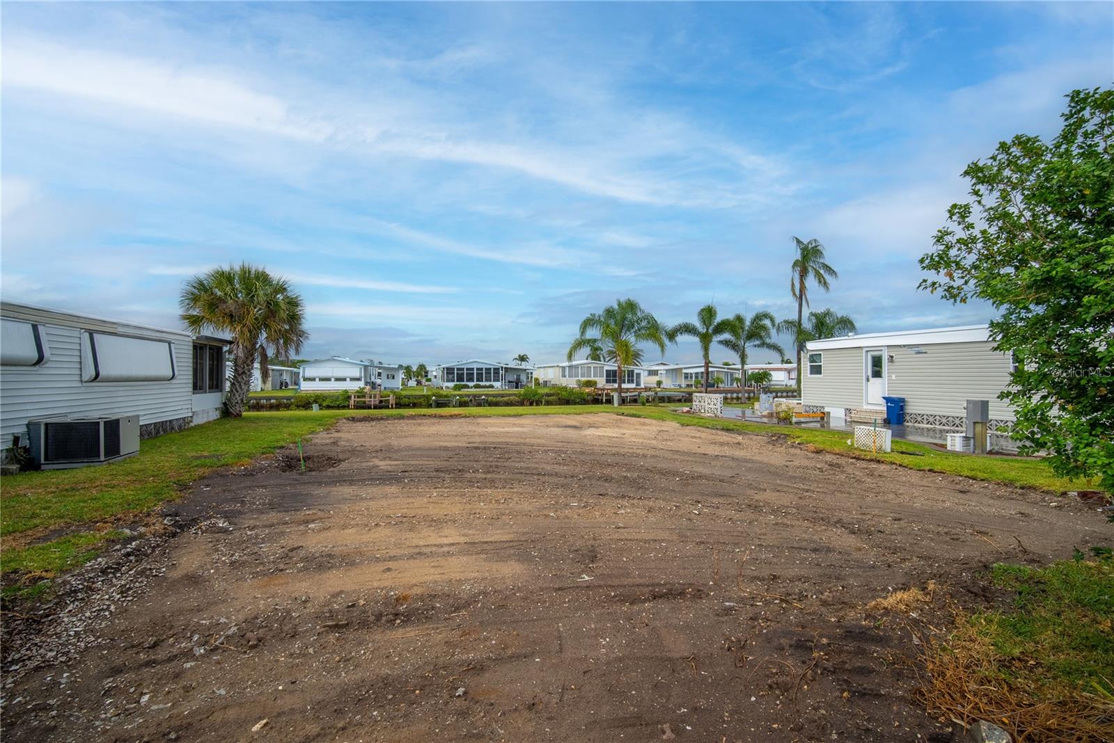 FANTASTIC OPPORTUNITY! Bring your boats for easy access to the Gulf with boat or kayak ramp and 90 slips for the residents. Harbor Cove leads right out to Myakka River for some of the best fishing around. Close to shopping and only 12 miles to some of the most beautiful beaches in SW Florida. Bring your boats for easy access to the Gulf with boat or kayak ramp and 90 slips for the residents. Harbor Cove leads right out to Myakka River for some of the best fishing around. Close to shopping and only 12 miles to some of the most beautiful beaches in SW Florida.