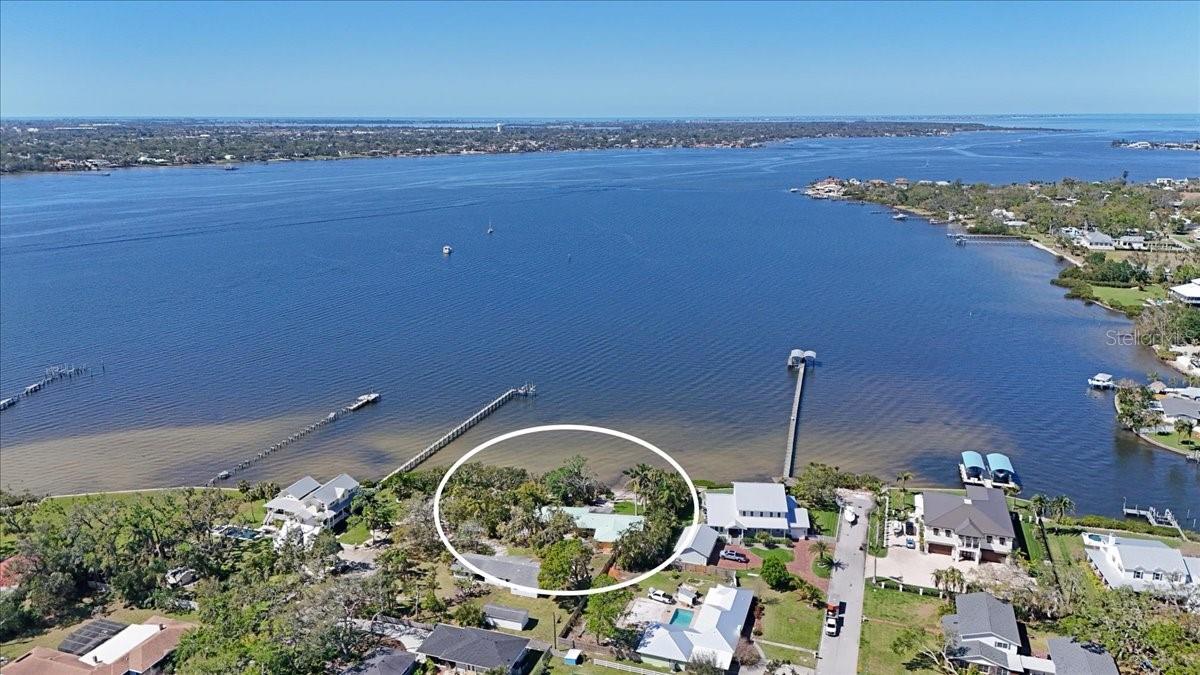 Amid life’s storms come the best opportunities. Nestled in the peaceful community of Palmetto, on the north bank of the Manatee River, this property offers a unique chance to create your dream home. The riverfront is alive with fishing, boating, and easy access to the Gulf and nearby bays. Enjoy breathtaking Florida sunsets over the river as they fade toward the Gulf. You can restore the tropical paradise of “Casa” or design a new home tailored to your vision. The pool and tiki bar remain intact, ready for your enjoyment—just bring your favorite drink. This property offers a rare blend of seclusion and tranquility while being conveniently located near Bradenton and St. Petersburg, offering easy access to airports, entertainment, theme parks, professional sporting events and all encompasses the Florida lifestyle. Casa was a lucrative vacation rental and could be again. Home was damaged in storm, mitigation has been done and the home is gutted and ready for restoration.