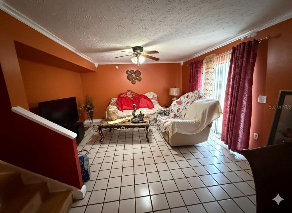 Photo of 12414 Touchton Drive #98, Tampa, FL 33617 (MLS # A4677236)