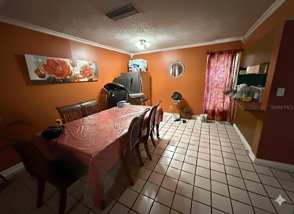 Photo of 12414 Touchton Drive #98, Tampa, FL 33617 (MLS # A4677236)