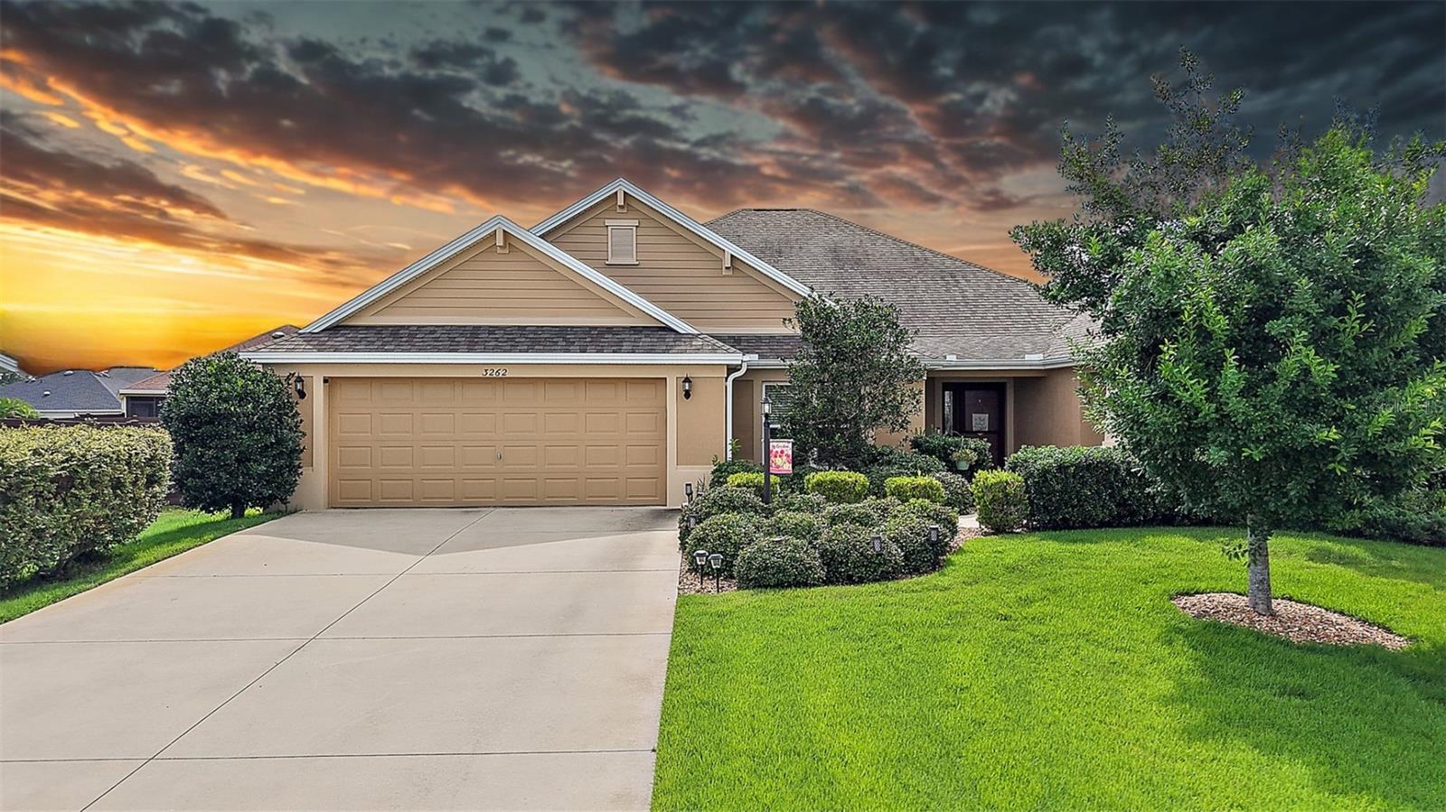 MAGNIFICENT 4/3 BLOCK and STUCCO Columbia Model with HEATED POOL on a PRIVATE, FENCED, OVERSIZED 1/3 acre CUL-DE-SAC LOT in the highly desirable, family-friendly, non-age-restricted, GATED community of Oxford Oaks! NO BOND! JUST MINUTES from The Villages retirement community, The Villages Charter Schools, and CR466 offering easy access to a plethora of shopping, dining, banking, medical and more! Lush landscaping and a charming FRONT PORCH welcome you in to the GENEROUS foyer. The interior of this GORGEOUS home features an EXPANSIVE OPEN LAYOUT with HIGH ceilings and TILE flooring throughout the kitchen and main living areas. The STUNNING GOURMET kitchen boasts STAGGERED cherry cabinetry, GRANITE countertops, GLASS-TILE backsplash, STAINLESS appliances, CENTER ISLAND, EAT-IN breakfast bar, and a HUGE PANTRY closet. The VOLUMINOUS living and dining rooms feature DOUBLE sets of SLIDING GLASS DOORS that lead to your own PRIVATE PARADISE with MATURE landscaping surrounding the entire perimeter! The STUNNING POOL features a serene WATERFALL and BEACH-ENTRY AREA - complete with Adirondack chairs and umbrella - offering the perfect spot to relax with a drink, read a book, or soak in the sun! For convenience, there’s also a pool-side cabana bath with WALK-IN shower—perfect for rinsing off after a swim. Whether you're hosting a poolside party or seeking peaceful solitude, this RESORT-STYLE RETREAT delivers it all! Step outside to the OVERSIZED FENCED YARD– perfect for enjoying the Florida sunshine! Whether you're dreaming of a backyard garden, or a space for children and/or pets to roam, this EXPANSIVE lot delivers endless possibilities! Back inside, retreat to the primary bedroom boasting LUXURY VINYL PLANK flooring, TRAY ceiling, TWO WALK-IN closets, and a separate mini-split A/C. It’s en-suite bathroom features CHERRY cabinetry, GRANITE countertops, DOUBLE sinks, TILED ROMAN-STYLE WALK-IN shower, SEPARATE water closet, and a LINEN closet. The SPLIT floor plan, offers two additional bedrooms and a full bathroom conveniently hidden behind a POCKET DOOR, creating a PRIVATE guest wing. Bedroom 2 boasts a LARGE WINDOW, TRAY ceiling, and built-in closet. The second bathroom features a CHERRY vanity with GRANITE top, TILED tub and shower combination, and a hall LINEN closet. The third bedroom has a VAULTED ceiling and built-in closet. There’s also a fourth bedroom with a built-in closet across the foyer. The INTERIOR LAUNDRY has CHERRY cabinetry, GRANITE countertops, DESK area with custom shelving above, utility sink, and hallway STORAGE closet. Completing the package is an OVERSIZED 24’x31’ two-car garage featuring a LARGE STORAGE closet, and attic access stairway with ADDITIONAL 6 1/2’ headroom STORAGE space. With so much to offer, THIS HOME IS A MUST SEE! The Oxford Oaks Community offers INCREDIBLE AMENITIES including: a Resort Style Swimming Pool; Pickle Ball, Tennis, and Basketball Courts; Outdoor Exercise Equipment; and a fabulous Children’s Playground! All for a LOW HOA payment of $55/month with NO ADDITIONAL FEES or BONDS! Conveniently located near the intersection of 466 and 301, Oxford Oaks is JUST MINUTES from The Villages retirement community, The Villages Charter Schools, and CR466 offering abundant shopping, dining, banking, medical, and more! DON’T MISS THE OPPORTUNITY TO MAKE THIS MAGNIFICENT POOL HOME IN AN AMAZING LOCATION YOUR OWN! Please watch our walkthrough video and call today to schedule your Private Showing or Virtual Tour!
