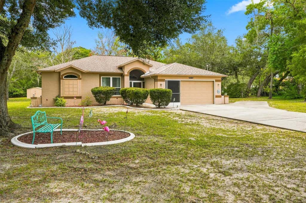 Photo of 1087 Trinidad Avenue, Spring Hill, FL 34609 (MLS # W7887961)