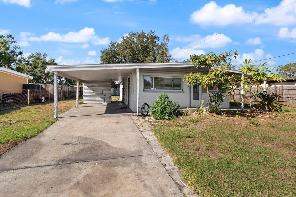 Photo of 1703 Warrington Way, Tampa, FL 33619 (MLS # TB8452225)