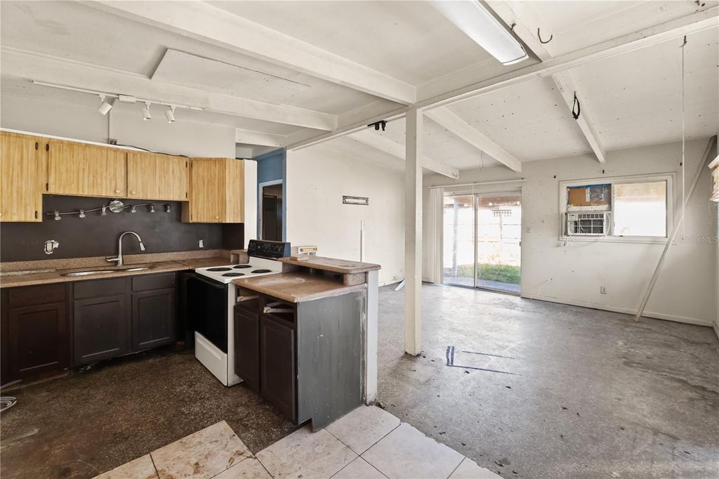 Photo of 1703 Warrington Way, Tampa, FL 33619 (MLS # TB8452225)