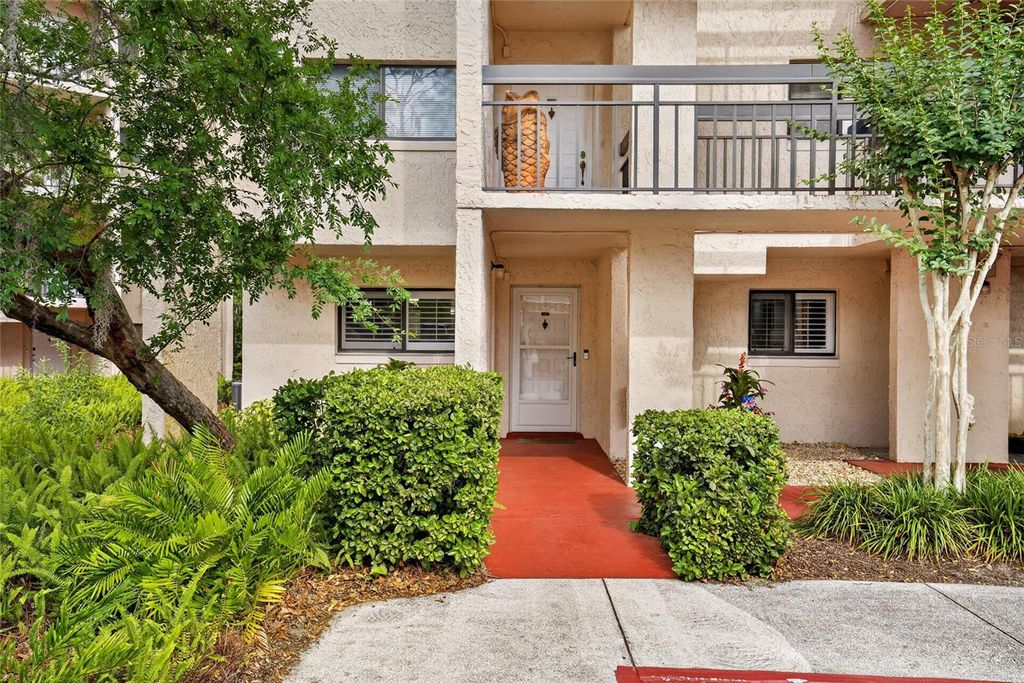 Photo of 1166 Carmel Circle #100, Casselberry, FL 32707 (MLS # O6404557)
