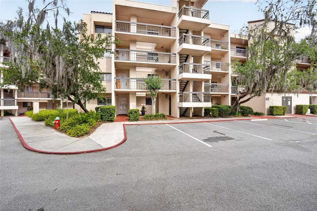 Photo of 1166 Carmel Circle #100, Casselberry, FL 32707 (MLS # O6404557)