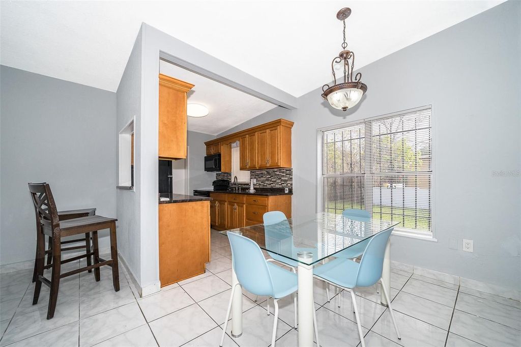 Photo of 1213 Lawne Boulevard, Orlando, FL 32808 (MLS # R4911553)