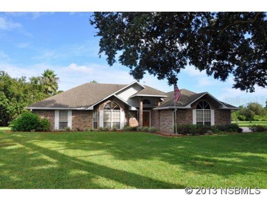 Unique opportunity to buy a home with elbow room so close to town! Featuring vaulted ceilings & large rooms. Gas fireplace in family room. Formal dining room + eat-in kitchen. Roof replaced 2004. Generator. Florida room, small patio, shuffleboard court & lakefrontage. Interior laundry room. Property goes to other side of lake. Some storm shutters stored in attic. ;Water: City