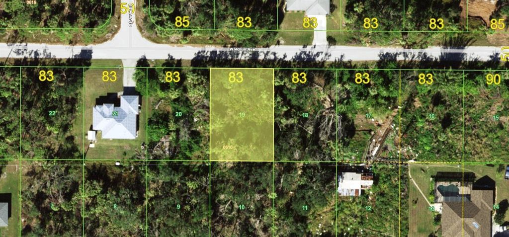 Photo of 17199 Waldrun Avenue, Port Charlotte, FL 33948 (MLS # W7879171)