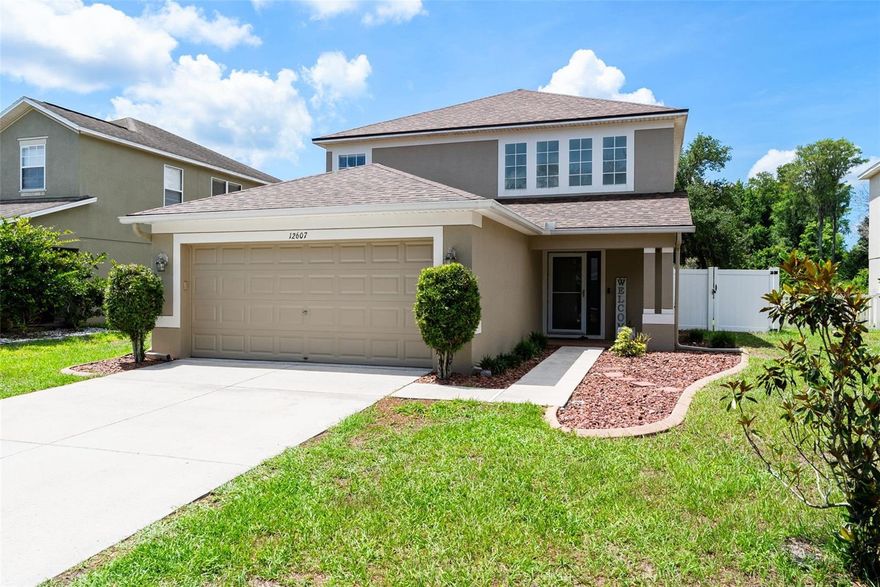 Welcome to 12607 Chenwood Ave, a beautifully maintained two-story home nestled in the sought-after Verandahs community of Pasco County. Backing up to a peaceful POND AND PRESERVE, this property offers the kind of quiet Florida lifestyle that’s hard to find — where mornings begin with serene water views and evenings can be spent unwinding with NO REAR NEIGHBORS behind you. The fully fenced backyard with a VINYL PRIVACY FENCE adds both comfort and functionality, creating the perfect space for pets, play, or relaxing outdoors.

This MOVE-IN READY home features 3 bedrooms, 2.5 bathrooms, and over 1,800 square feet of thoughtfully designed living space. The open-concept first floor showcases stylish LUXURY VINYL PLANK FLOORING, spacious living and dining areas, and an abundance of natural light throughout. The updated kitchen offers modern cabinetry, sleek countertops, STAINLESS STEEL APPLIANCES, a contemporary backsplash, breakfast bar seating, and striking designer accents that give the space character and warmth.

Upstairs, the spacious PRIMARY SUITE features a tray ceiling, WALK-IN CLOSET, and private ensuite bath, while the additional bedrooms provide flexibility for family, guests, or a home office setup. Downstairs, sliding glass doors lead to the backyard, where you can enjoy the peaceful preserve views and outdoor living space year-round.

Additional upgrades and features include a BRAND NEW ROOF installed in May 2026, a 2-CAR ATTACHED GARAGE, rain gutters, CENTRAL A/C, public utilities, and a LOW MONTHLY HOA. Residents of this GATED COMMUNITY enjoy amenities including a COMMUNITY POOL, offering a wonderful blend of relaxation, recreation, and convenience. Conveniently located near shopping, dining, schools, and major roadways, this home combines peaceful living with everyday accessibility.

If you’ve been looking for a home that blends MODERN UPDATES, FUNCTIONAL LIVING, and PEACEFUL SURROUNDINGS, this one is not to be missed.