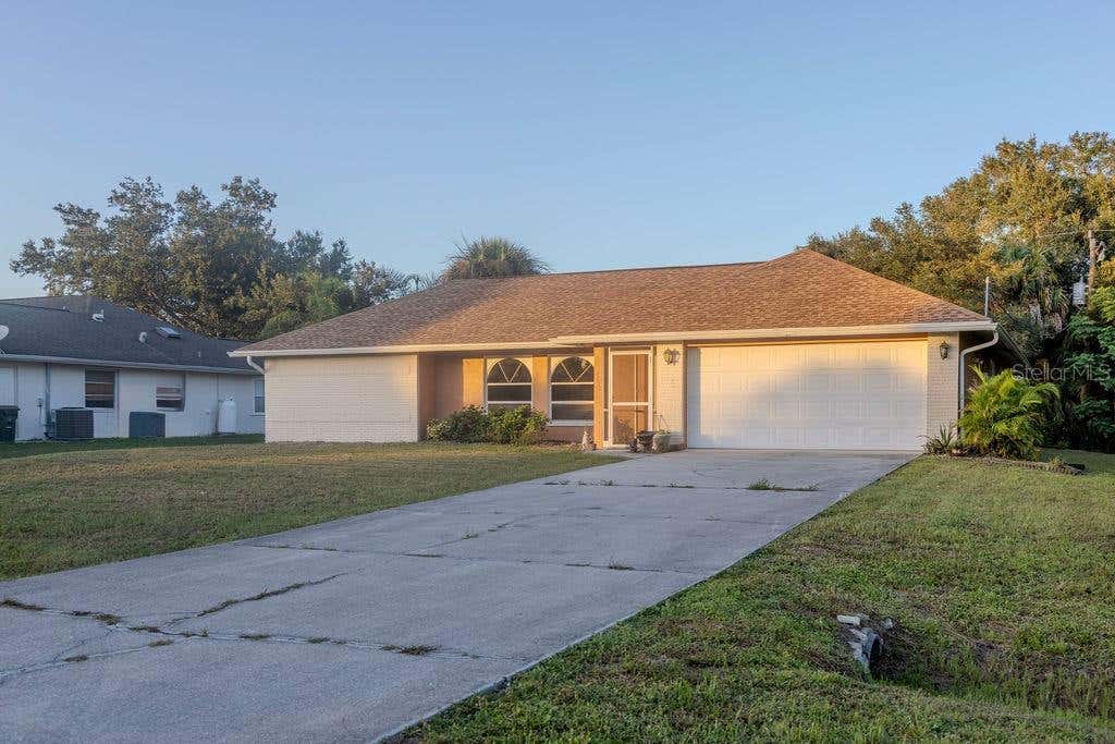 Photo of 1570 S Biscayne Drive, North Port, FL 34287 (MLS # W7888747)