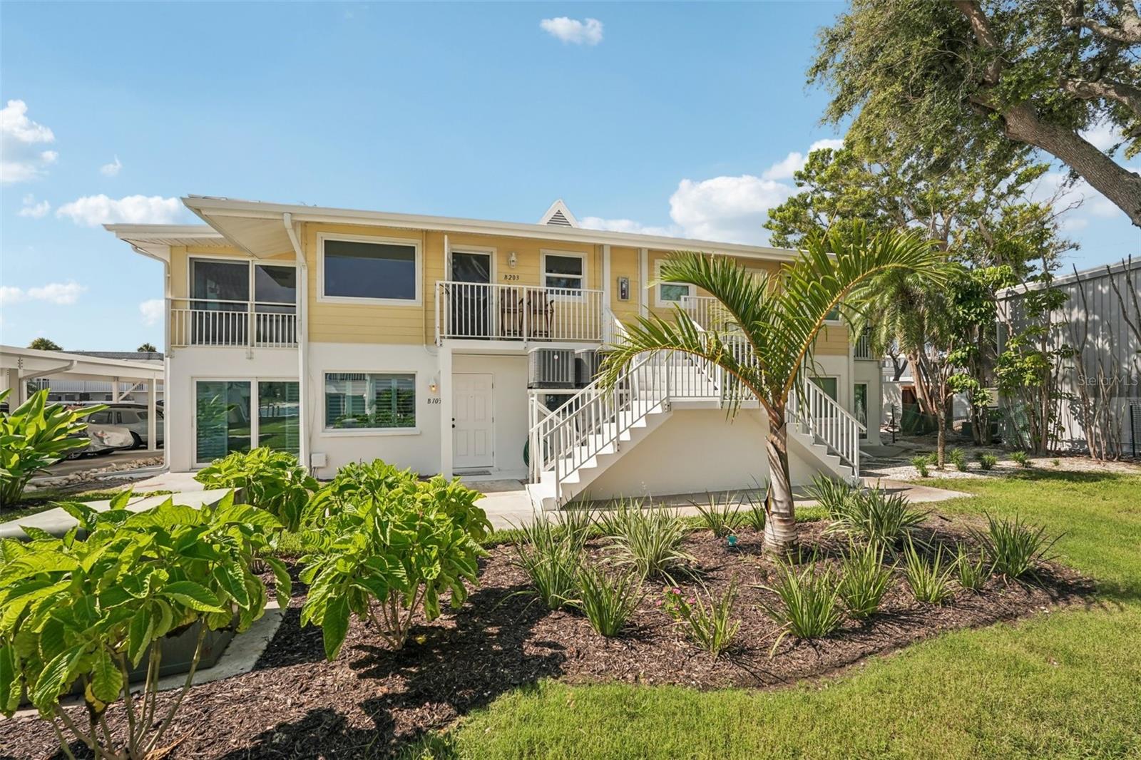 One or more photo(s) has been virtually staged. Enjoy the best of coastal living in this beautifully updated 2-bedroom, 2-bath condo on the coveted Island of Venice. With a private community dock, you can be out on the water and fishing in the Gulf within minutes. Plus, you'll love the peek-a-boo views of the Intracoastal Waterway right from your home. Inside, you'll find tile flooring throughout, all-new electrical and plumbing, hurricane-rated windows, and plantation shutters for a polished coastal feel. This new and modern kitchen boasts KraftMaid cabinets, quartz countertops, abundant storage, and a brand-new GE refrigerator, stove, and dishwasher. The spacious primary suite offers his-and-her closets, a cozy sitting area, and an updated en-suite bathroom with plenty of counter space. This waterfront community also features a sparkling pool and deeded beach access just steps away. Walk to the Crow's Nest for lunch or dinner, or spend the day on the sand—it’s all right at your doorstep. Your dream island lifestyle awaits—schedule your private showing today!