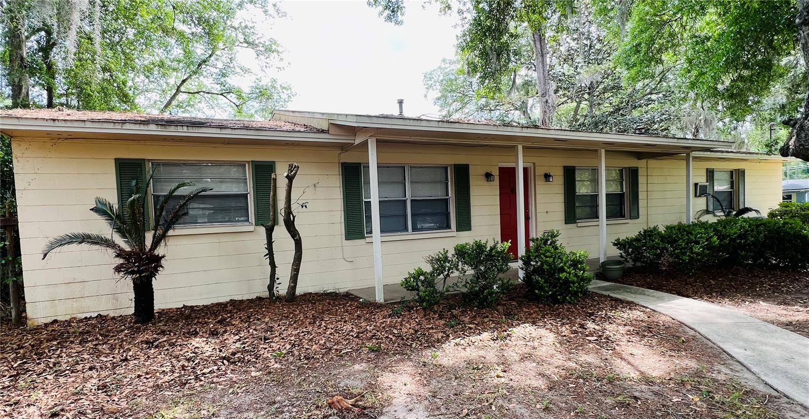 This is a well built concrete block home near the YMCA that has been a rental for many years. The roof was installed in 2014 and the A/C in 2016. The home has 1954 heated/cooled sq ft with 3 bedrooms 2 baths, a florida room and either a study or possibly 4th BR. However the home does need updating and has been priced accordingly. It is currently zoned for Norton Elementary, Westwood Middle School, and Gainesville High School. It is centrally located so that you can get to the University of Fla or the Oaks Mall in about 20 minutes.