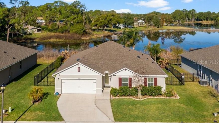 Rare opportunity to own a newer lakefront pool home on Lake Gleason with direct lake access and breathtaking west-facing sunset views.

Launch a kayak, paddle boat, or fish right from your backyard while enjoying your private saltwater pool and screened lanai overlooking the water.  Built in 2021, this modern 4-bedroom, 2-bathroom home in Lake  Gleason Reserve subdivision combines smart technology, stylish finishes, and the relaxed lifestyle that makes Florida waterfront living so special.  Imagine ending each day relaxing by the pool as the sun sets across the lake and the water reflects the changing colors of the evening sky.  Or sitting around the fire pit as the sun sets.

Inside, the home features a bright open floor plan designed for comfortable everyday living and effortless entertainment. The kitchen flows seamlessly into the living and dining areas and is highlighted by a stylish wood-accent kitchen island, creating a warm and inviting focal point. The French lanai doors open to the screened lanai and private saltwater pool, creating an ideal indoor-outdoor living space that takes full advantage of the tranquil lake views.

The home also includes numerous thoughtful upgrades and efficiency features including smart home technology with smart thermostat, smart doorbell, and electronic front door, along with USB outlets throughout the home. Additional features include a whole-home air purification system, water conditioning system, generator hookup, cedar pantry and extra attic insulation.  There are many more.

The property is fully fenced and lavishly landscaped, with a French drainage system designed to help maintain the yard efficiently, and the exterior of the home was freshly painted within the past six months, adding to its move-in ready appeal.  The home has been thoughtfully maintained, allowing buyers to move in and begin enjoying the lakefront lifestyle immediately.

Homes that combine newer construction, direct lake access, and a private pool are rarely available together under $500,000, making this a truly special opportunity.


If you’ve been searching for a newer construction lakefront home with a private pool in Central Florida, this property delivers the rare combination of waterfront access, resort-style outdoor living, and modern upgrades that define the best of Central Florida living.
