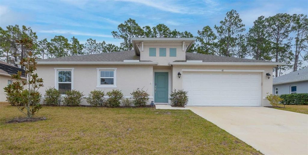 Photo of 42 Woodborn Lane, Palm Coast, FL 32164 (MLS # FC316330)