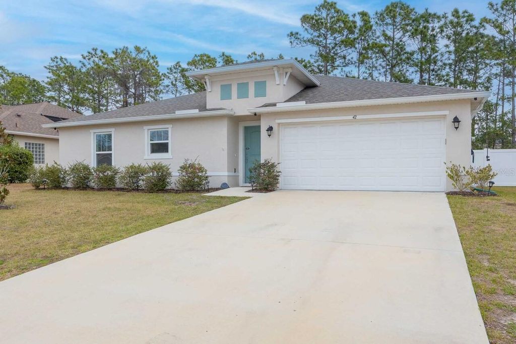 Photo of 42 Woodborn Lane, Palm Coast, FL 32164 (MLS # FC316330)