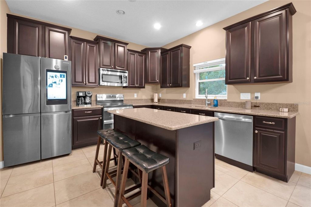 Photo of 1301 Gleneagles Lane, Davenport, FL 33896 (MLS # O6384660)