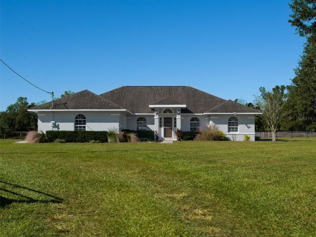Photo of 4698 NW 110th Avenue, Ocala, FL 34482 (MLS # OM721953)