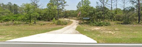 Photo of 591 SE Fisher Road, Ocklawaha, FL 32179 (MLS # OM709183)