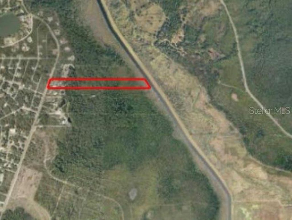 Photo of 591 SE Fisher Road, Ocklawaha, FL 32179 (MLS # OM709183)