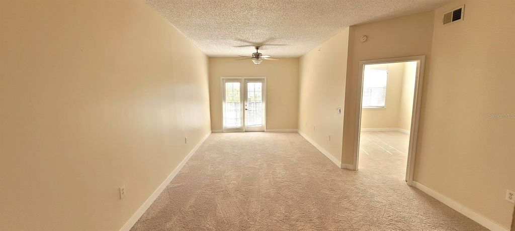 Photo of 3508 Windy Walk Way #6301, Orlando, FL 32837 (MLS # O6402639)