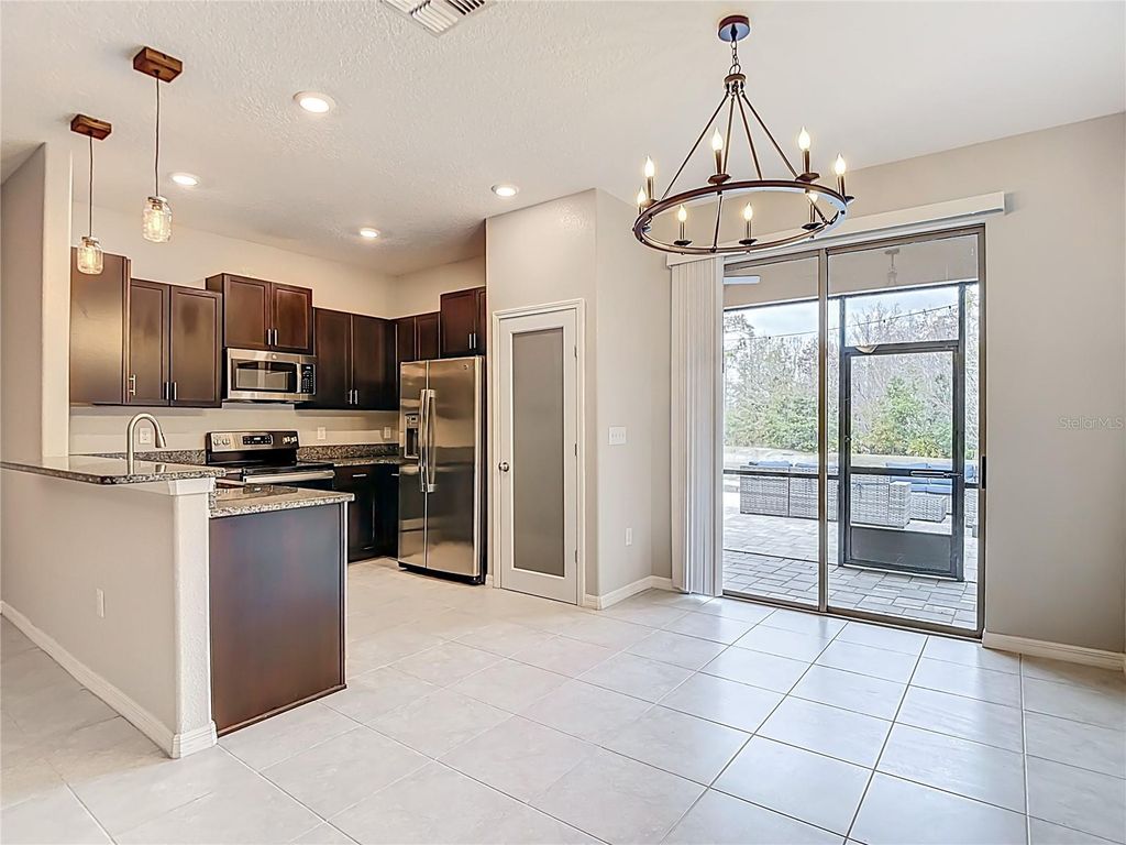 Photo of 11709 Castine Street, New Port Richey, FL 34654 (MLS # TB8476888)